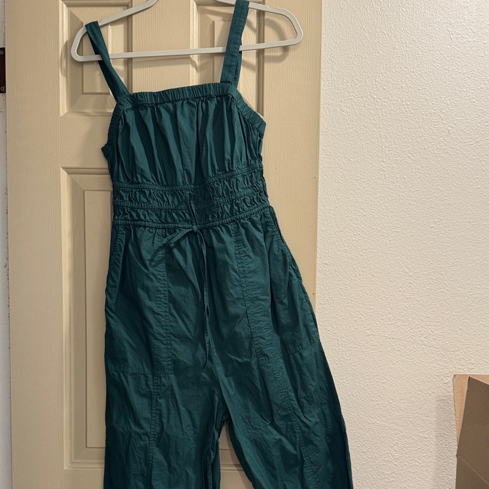 This is a teal green jumpsuit from Universal Thread.
